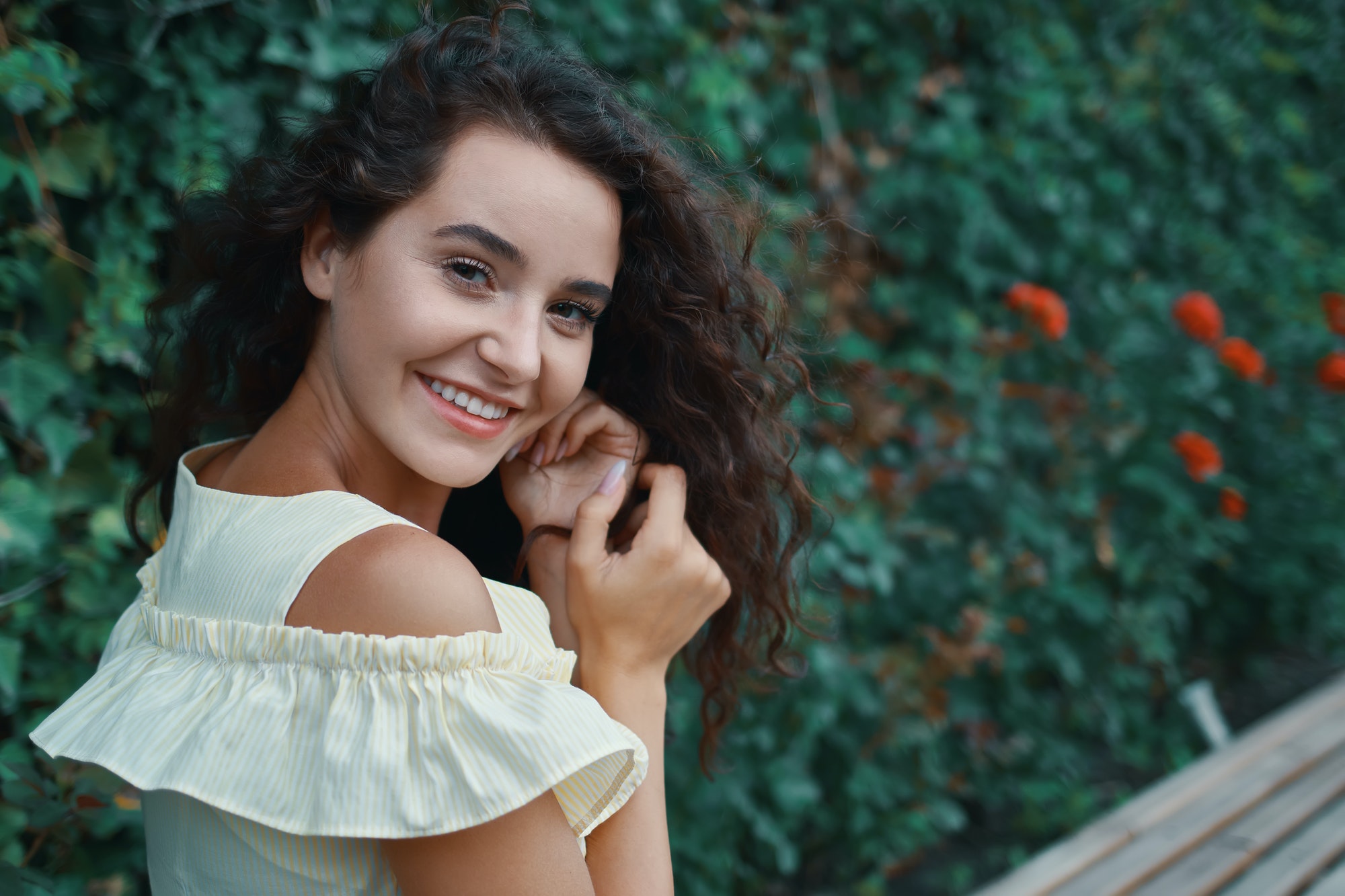 Romantic young woman with an adorable smile